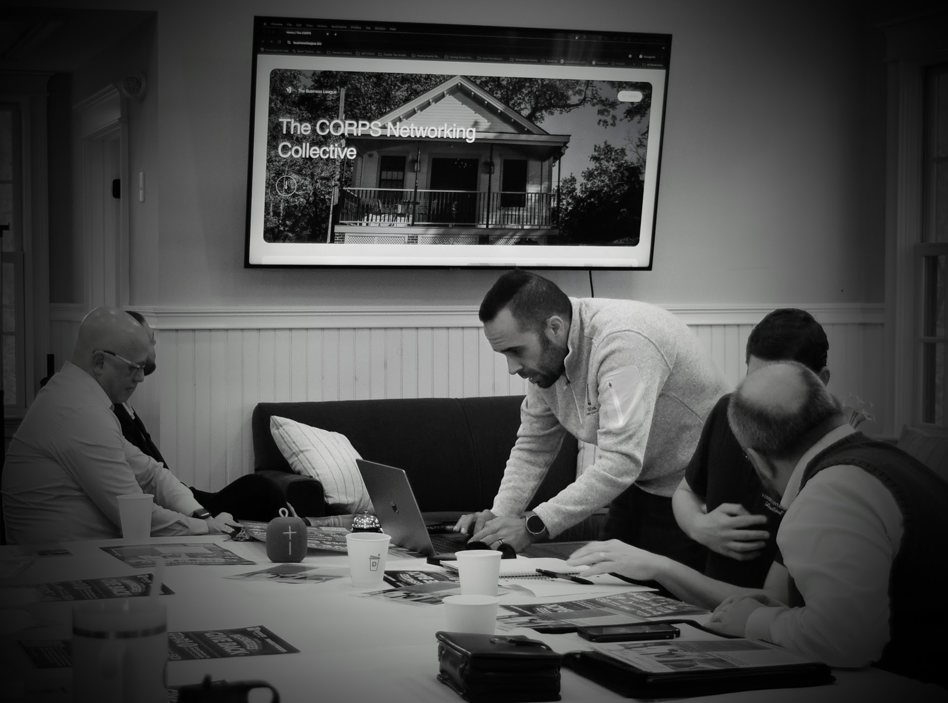 Joshua Pereira collaborating with business professionals